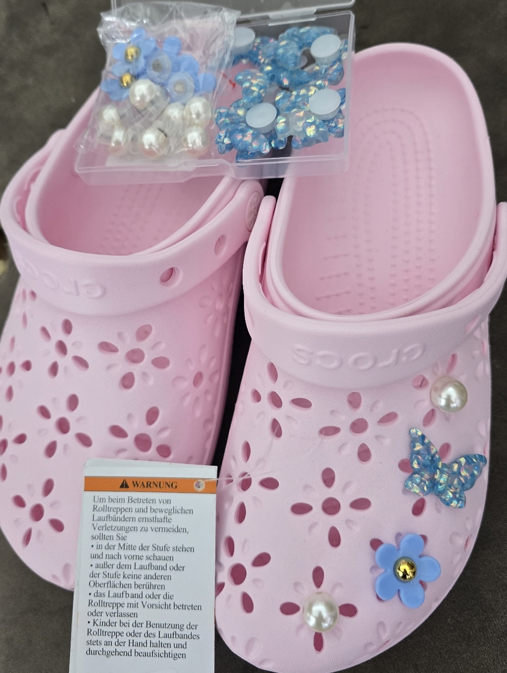 CROCS Kids Pink Floral Clogs with Blue and Pearl Charms
